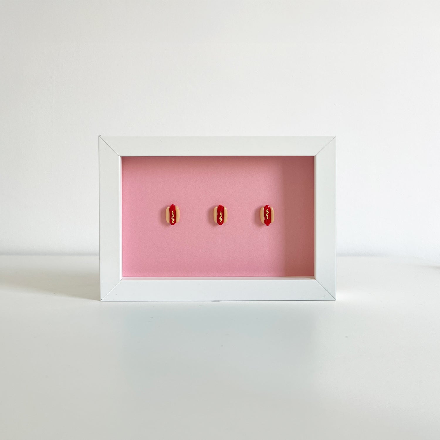 Completos Rosado - Cuadro con miniaturas en relieve